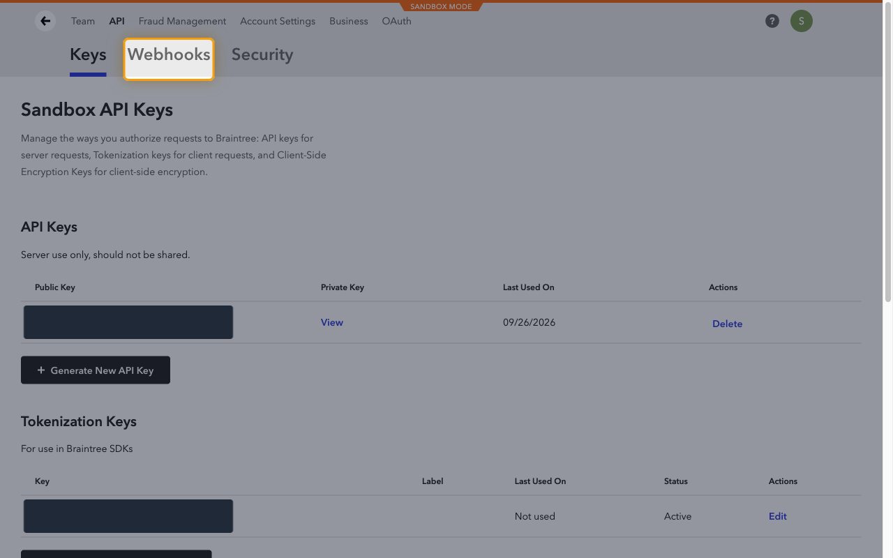Braintree API page with the Webhooks tab highlighted and the API key values redacted.