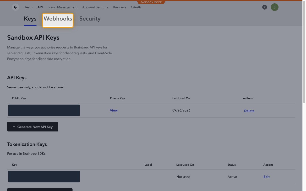Braintree API page with the Webhooks tab highlighted and the API key values redacted.