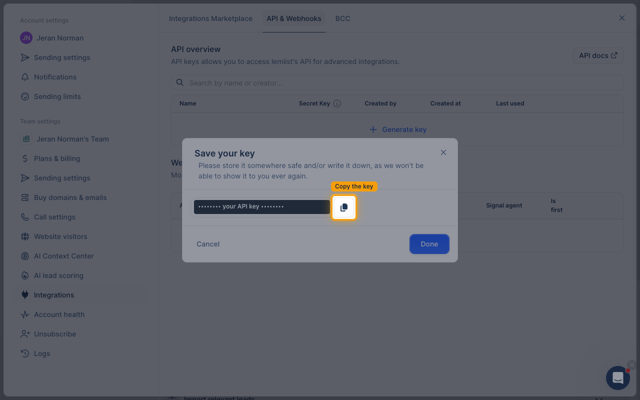 The Save your key dialog with the copy icon highlighted and the key value hidden.