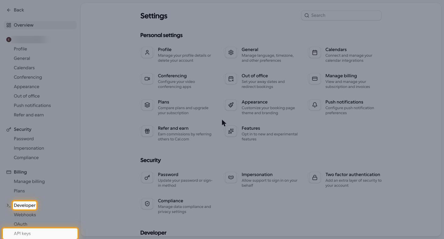 The Cal.com settings sidebar with Developer and API keys highlighted