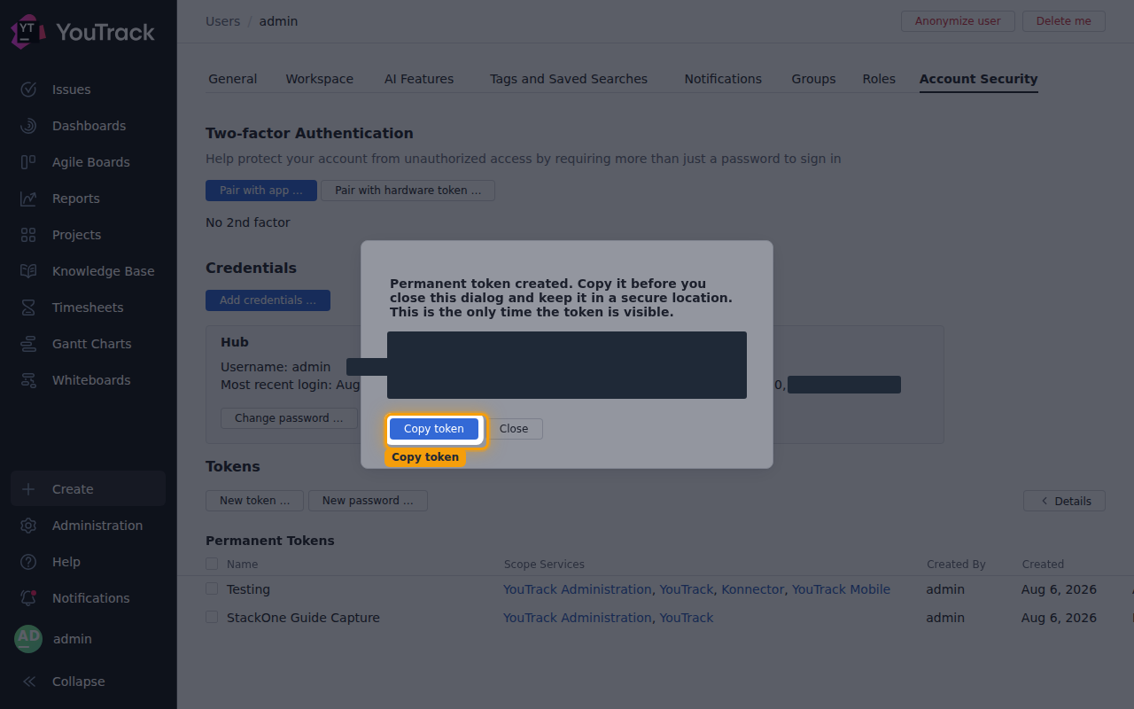 The token-created dialog with the token value hidden and the Copy token button highlighted.