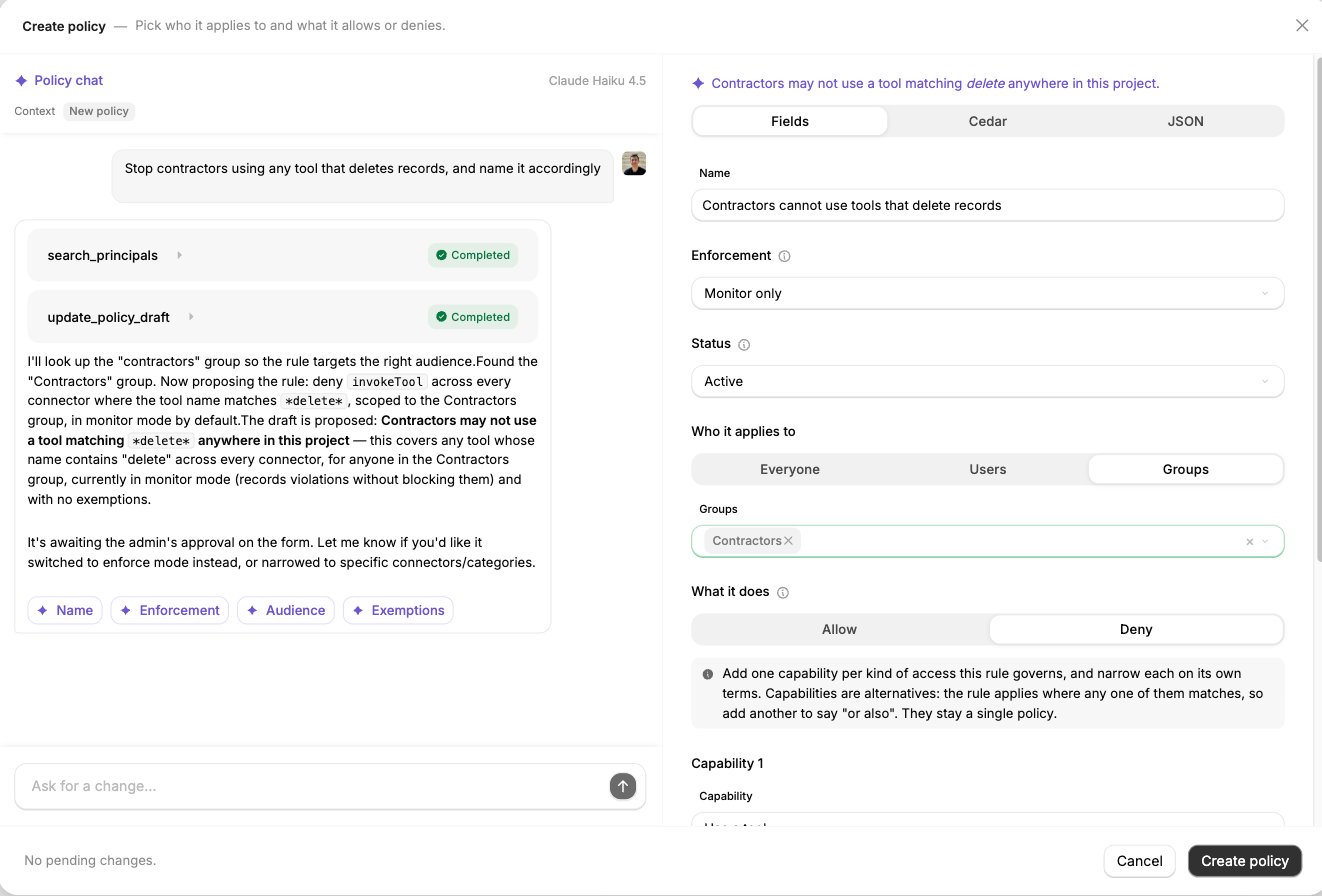Create policy panel with Policy chat on the left and the form on the right, showing a policy named Contractors cannot use tools that delete records, Enforcement set to Monitor only, Status set to Active, the audience set to the Contractors group, and a Deny rule on the Use a tool capability