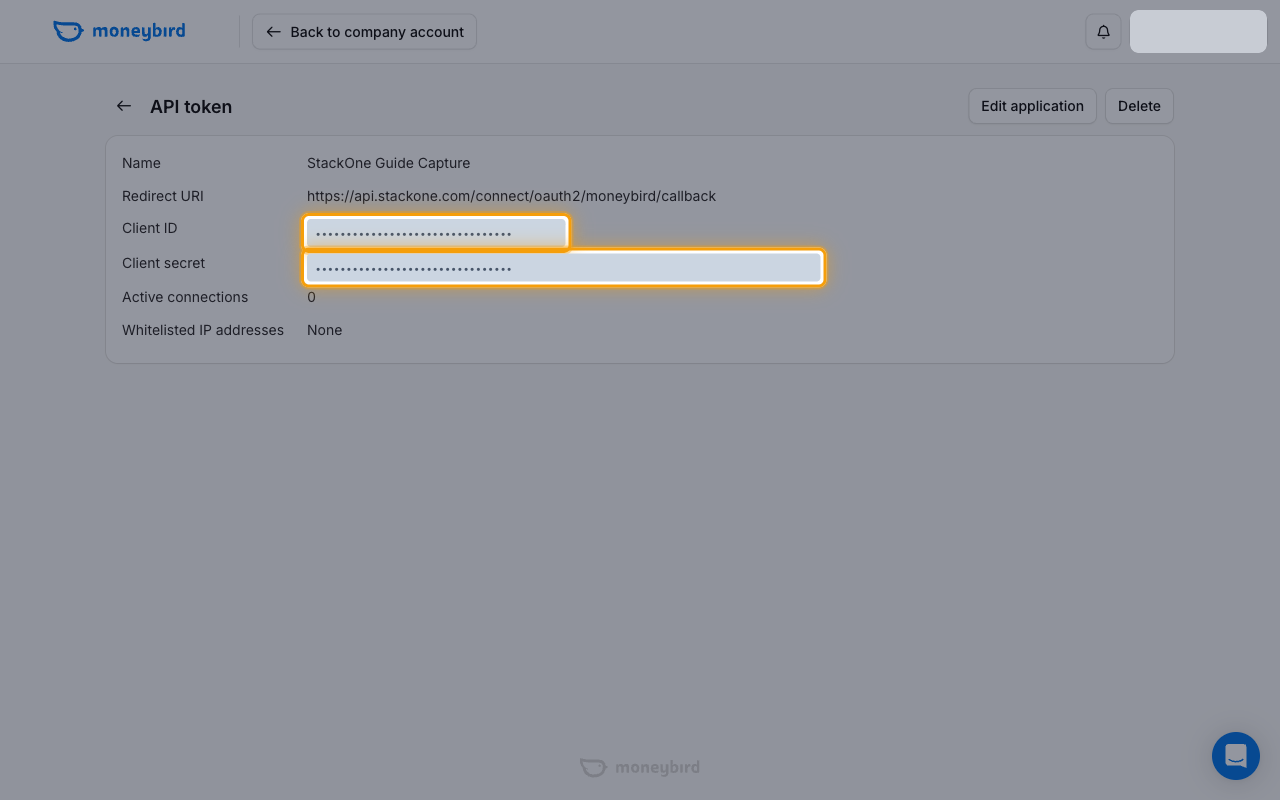 API token page with the Client ID and Client secret values highlighted (values redacted)