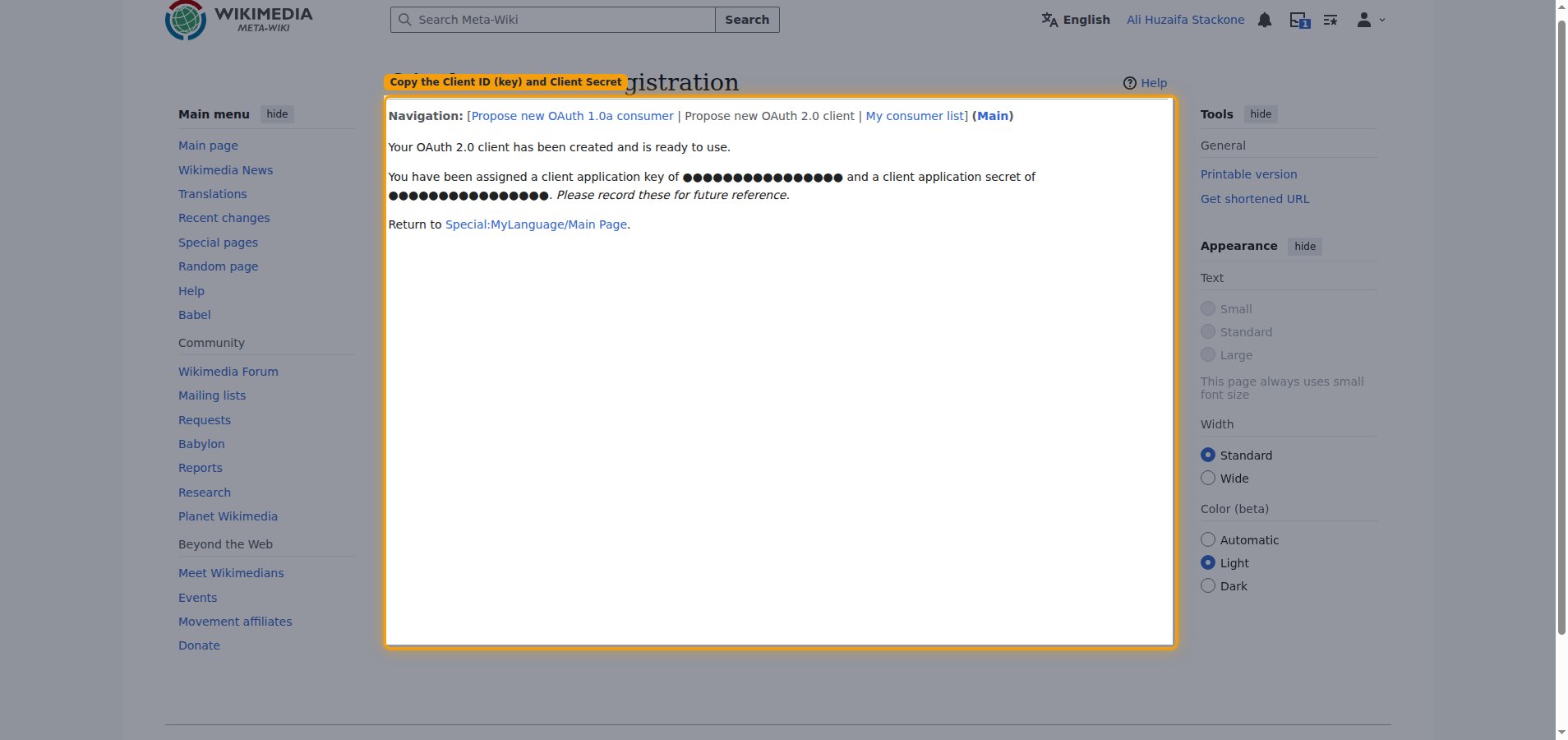Client creation result screen showing the assigned client application key and client application secret, both redacted
