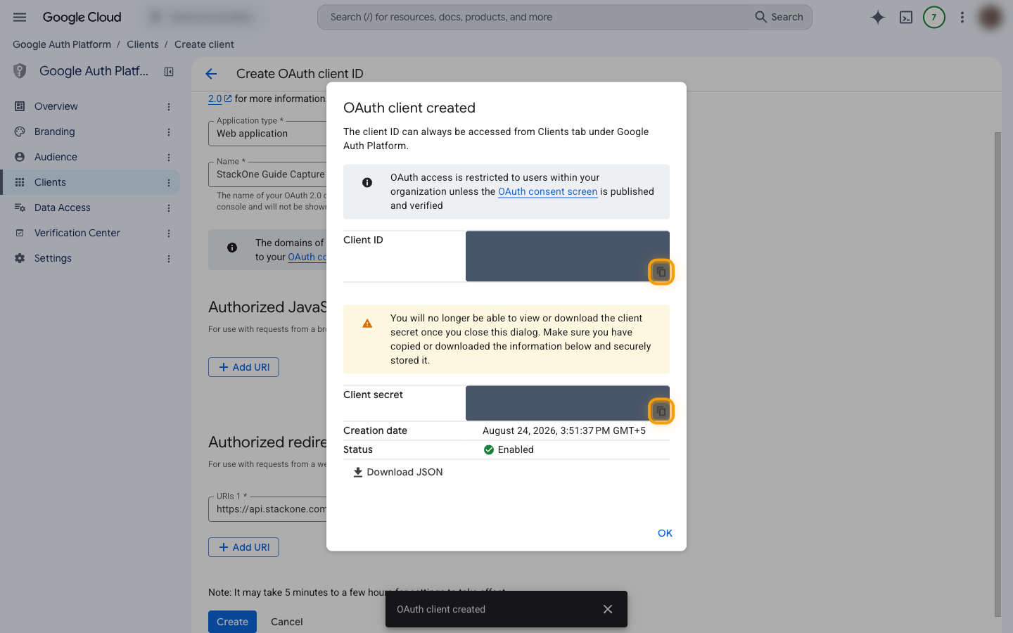The OAuth client created dialog showing the Client ID and Client secret rows with their copy buttons highlighted
