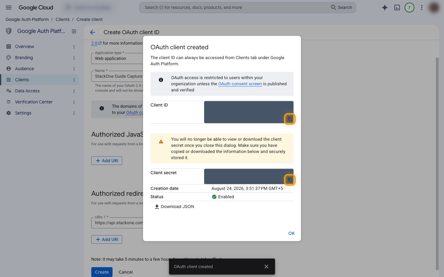 The OAuth client created dialog showing the Client ID and Client secret rows with their copy buttons highlighted