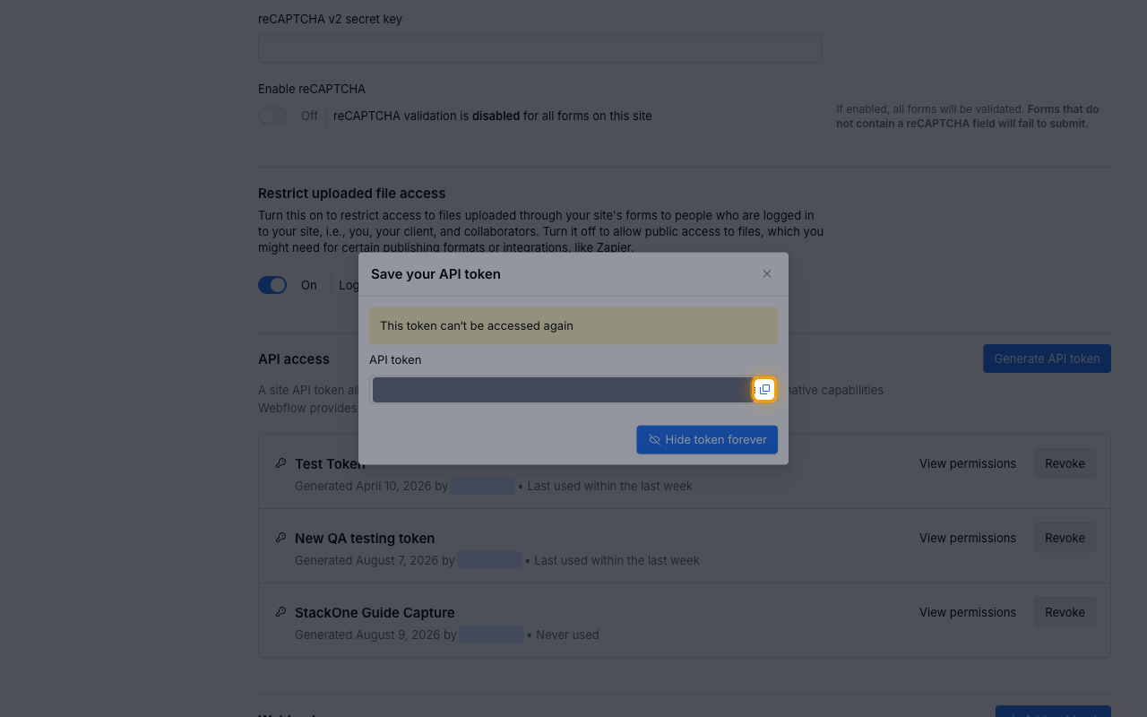 The Save your API token dialog with the token value redacted and its copy button highlighted
