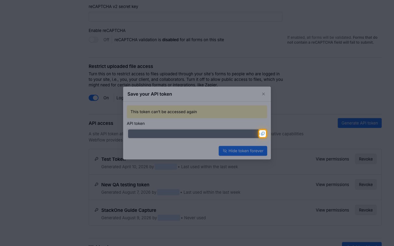 The Save your API token dialog with the token value redacted and its copy button highlighted