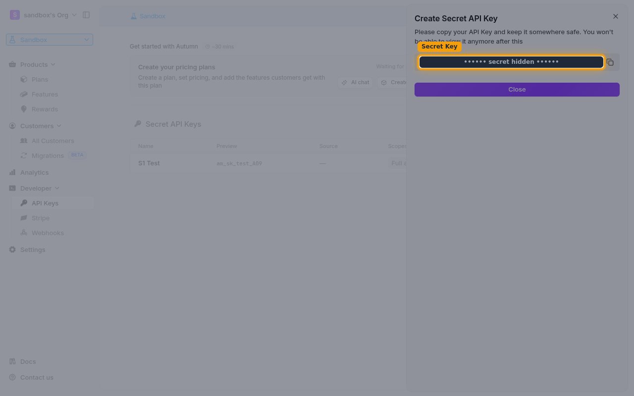 The dialog showing the newly created secret key (value hidden) with the copy button