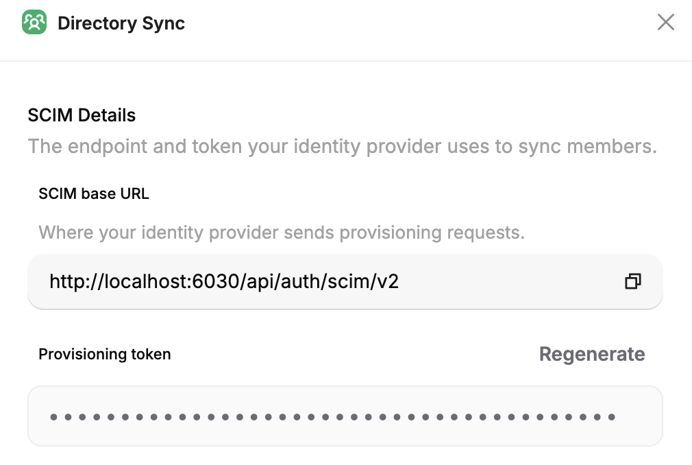 The Directory Sync panel showing the SCIM base URL and the masked provisioning token with a Regenerate action.