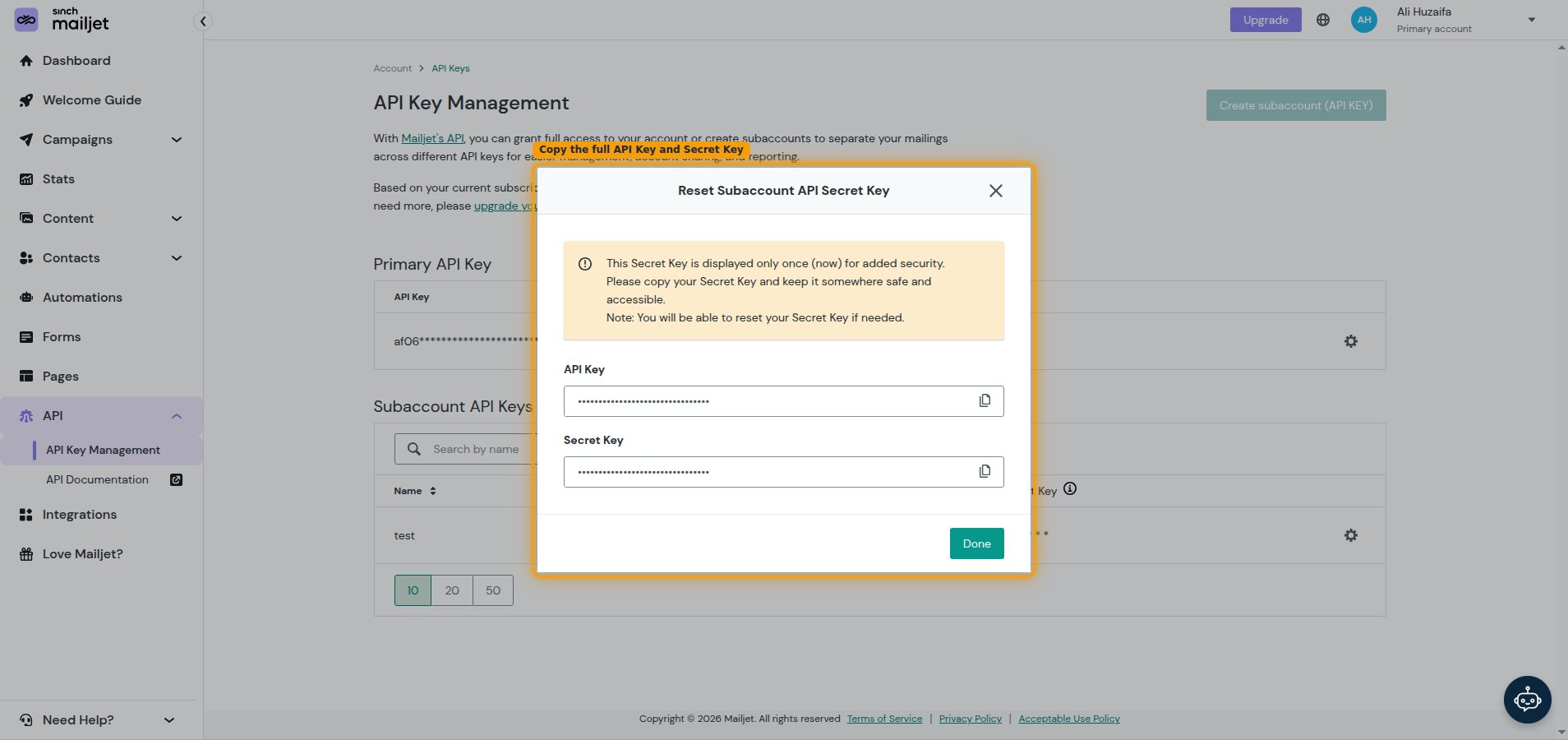 Modal showing the subaccount API Key and Secret Key fields (values redacted) each with a Copy to clipboard button