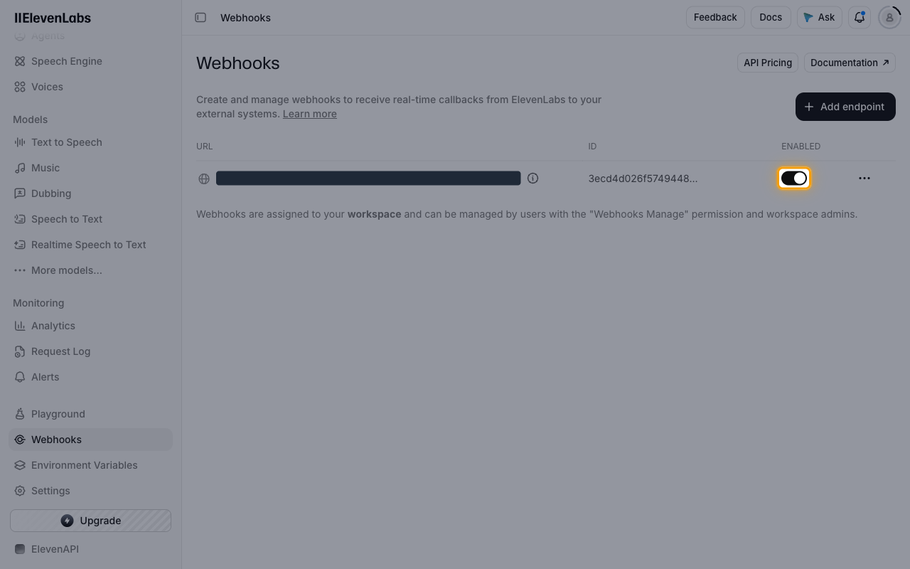 Webhooks list with the new endpoint and its ENABLED toggle highlighted