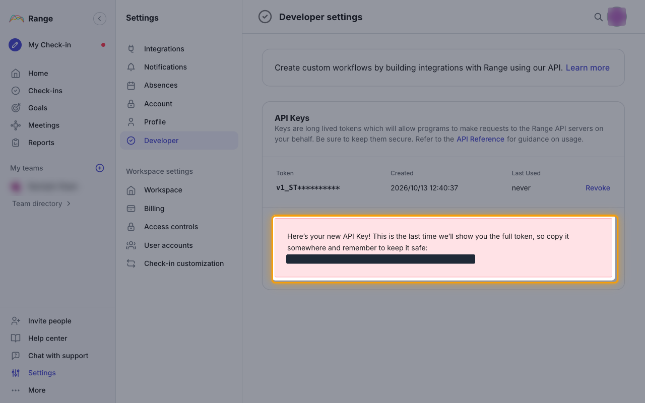 Confirmation message showing the new API key, with the token value redacted