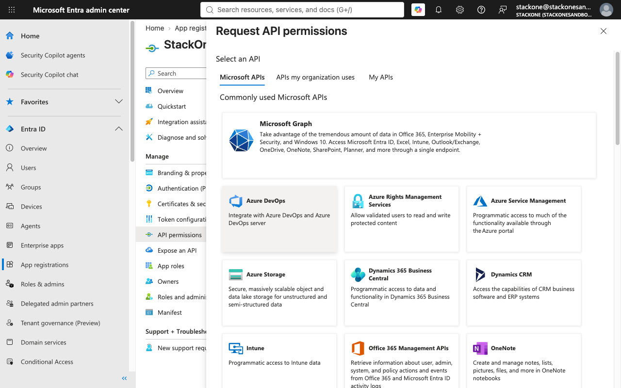 Request API permissions panel showing the Select an API step with Microsoft Graph listed under Commonly used Microsoft APIs.