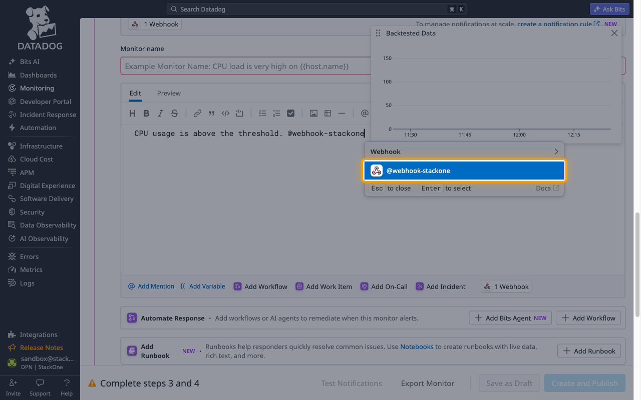 Datadog New Monitor notification message with @webhook-stackone selected from the Webhook suggestions