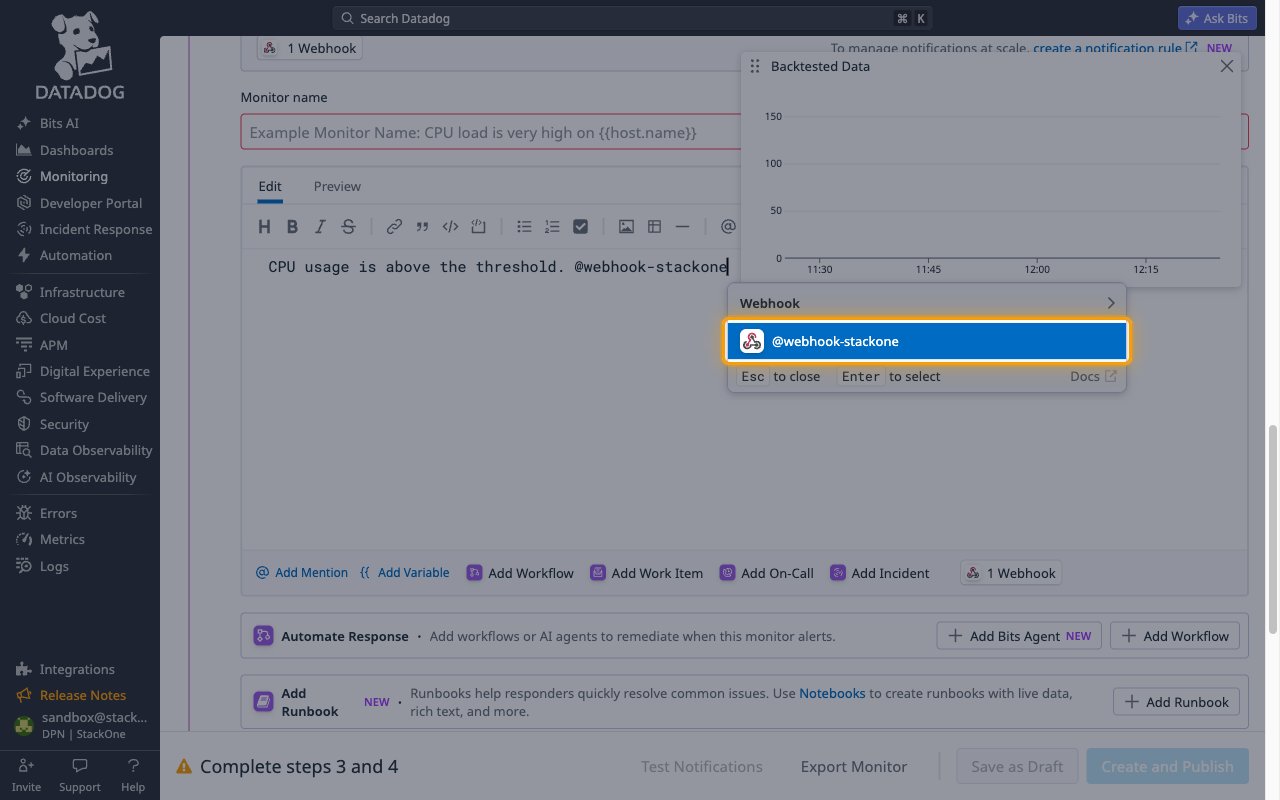 Datadog New Monitor notification message with @webhook-stackone selected from the Webhook suggestions