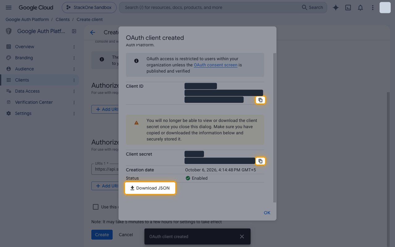 OAuth client created dialog with the Client ID and Client secret values hidden and the copy icons and Download JSON button highlighted