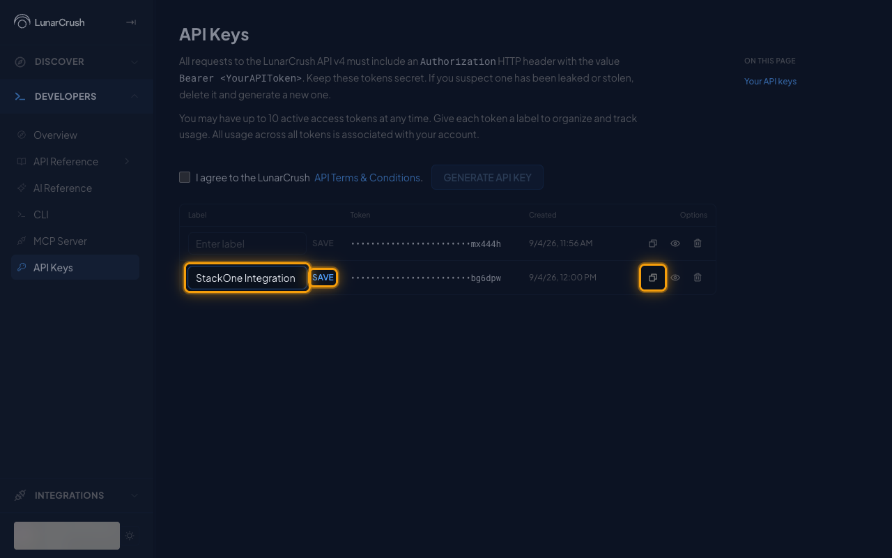 The new API key row with the label field, Save, and Copy token highlighted