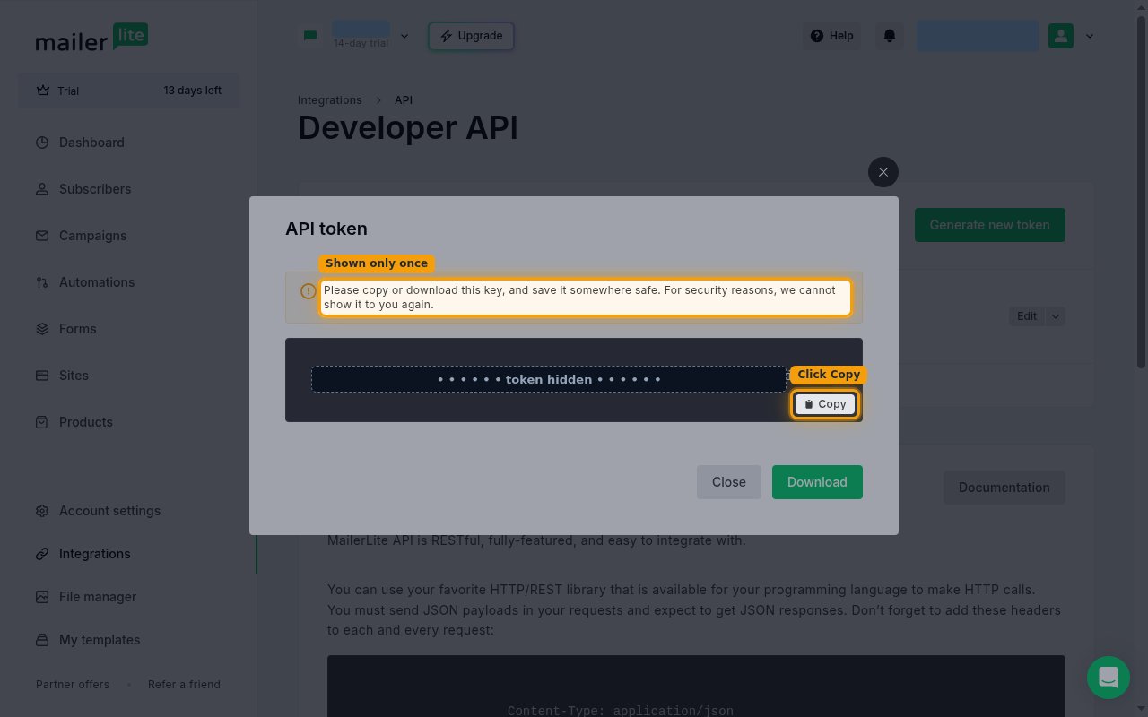 The generated API token screen with the token value hidden and the Copy button highlighted.