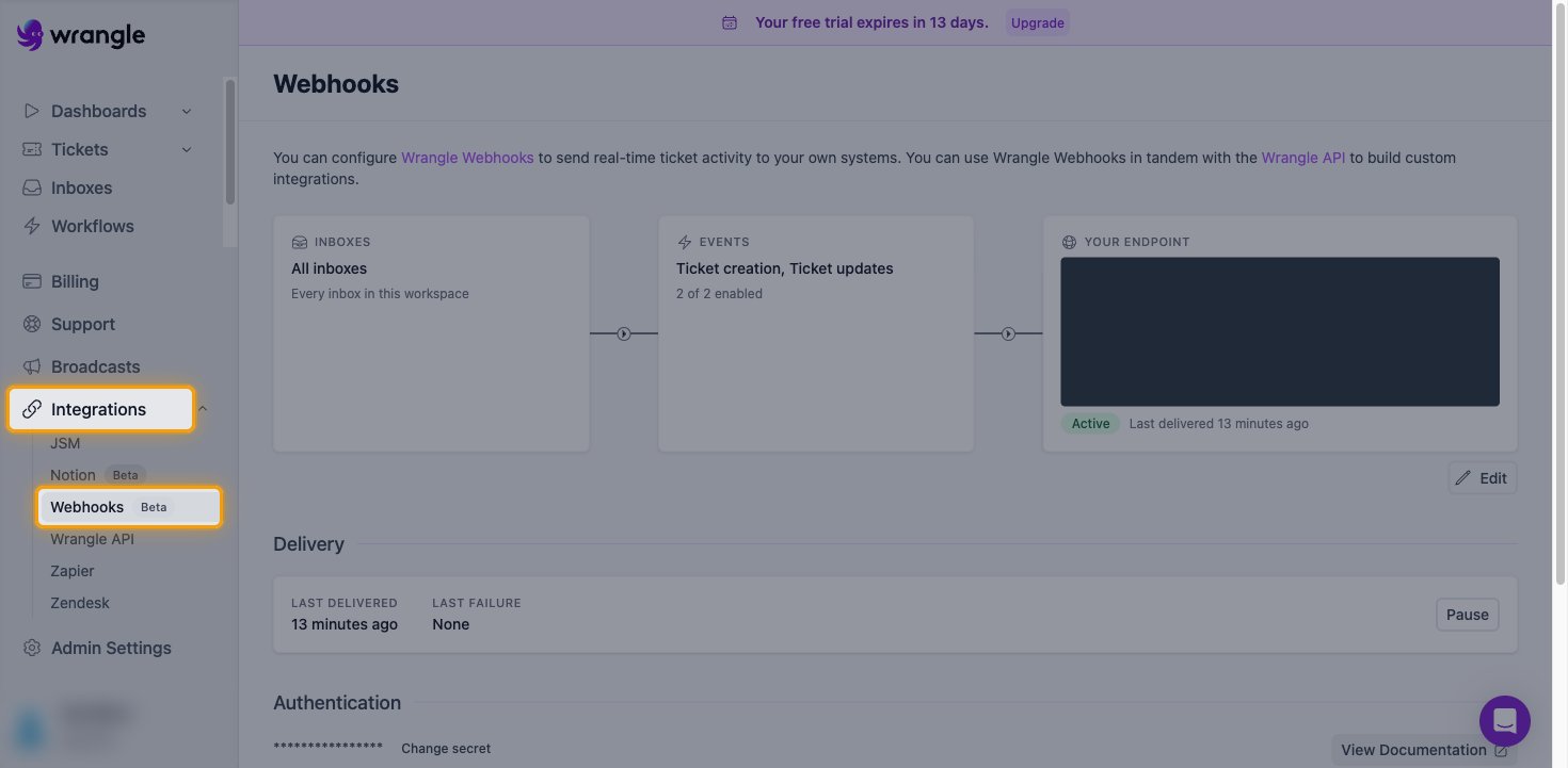 The Wrangle Webhooks page with Integrations and Webhooks highlighted in the sidebar