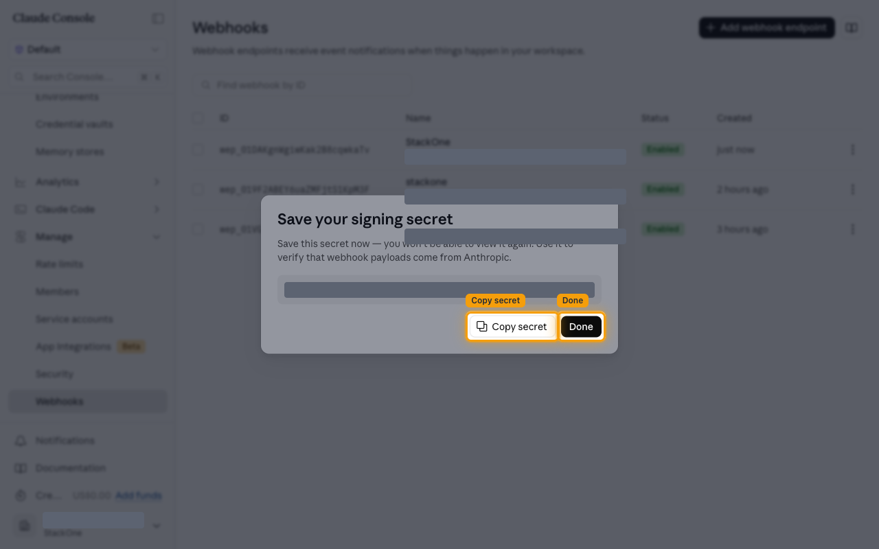 The Save your signing secret dialog with the Copy secret and Done buttons highlighted and the secret value masked.