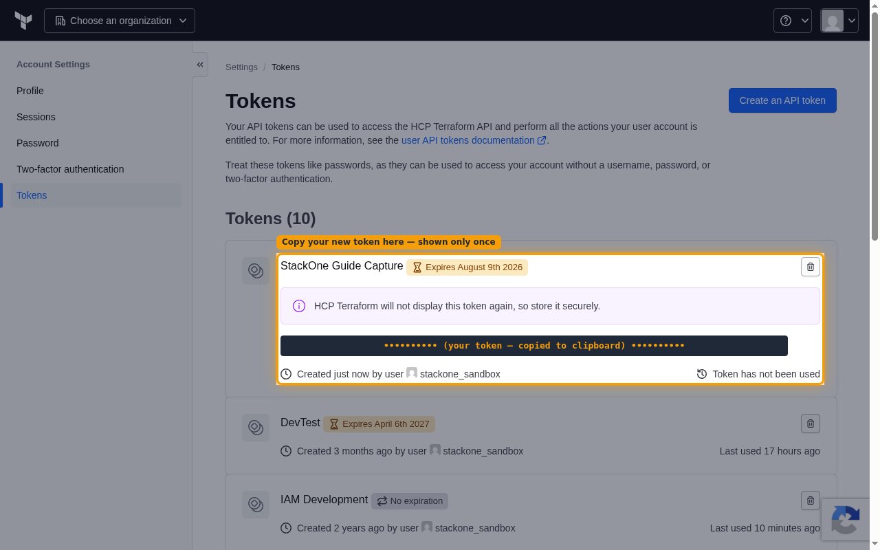 The newly created token shown inline on the Tokens page with the copy button and the store-securely warning