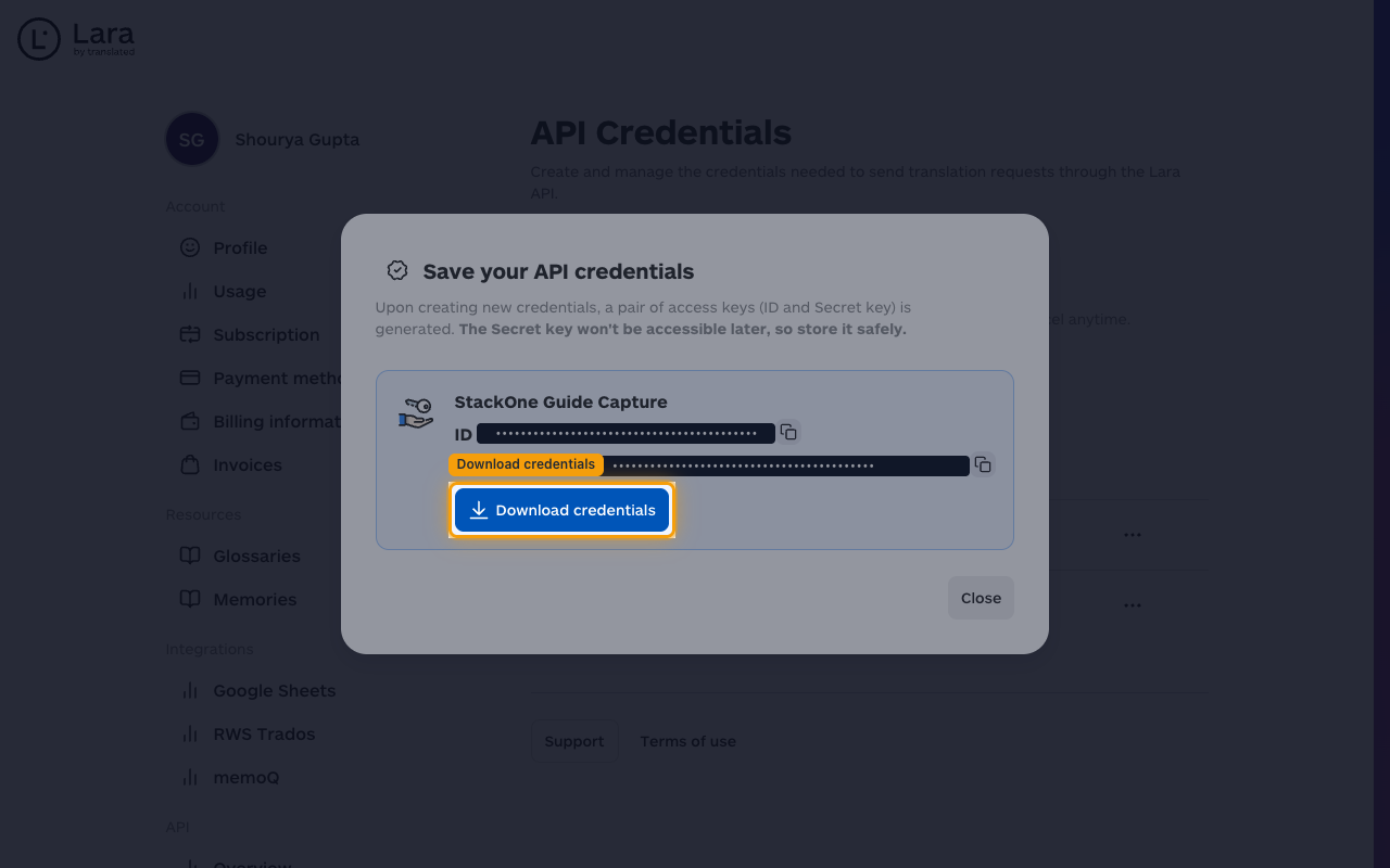 Save your API credentials dialog showing the ID and Secret rows (values redacted) with the Download credentials button highlighted.