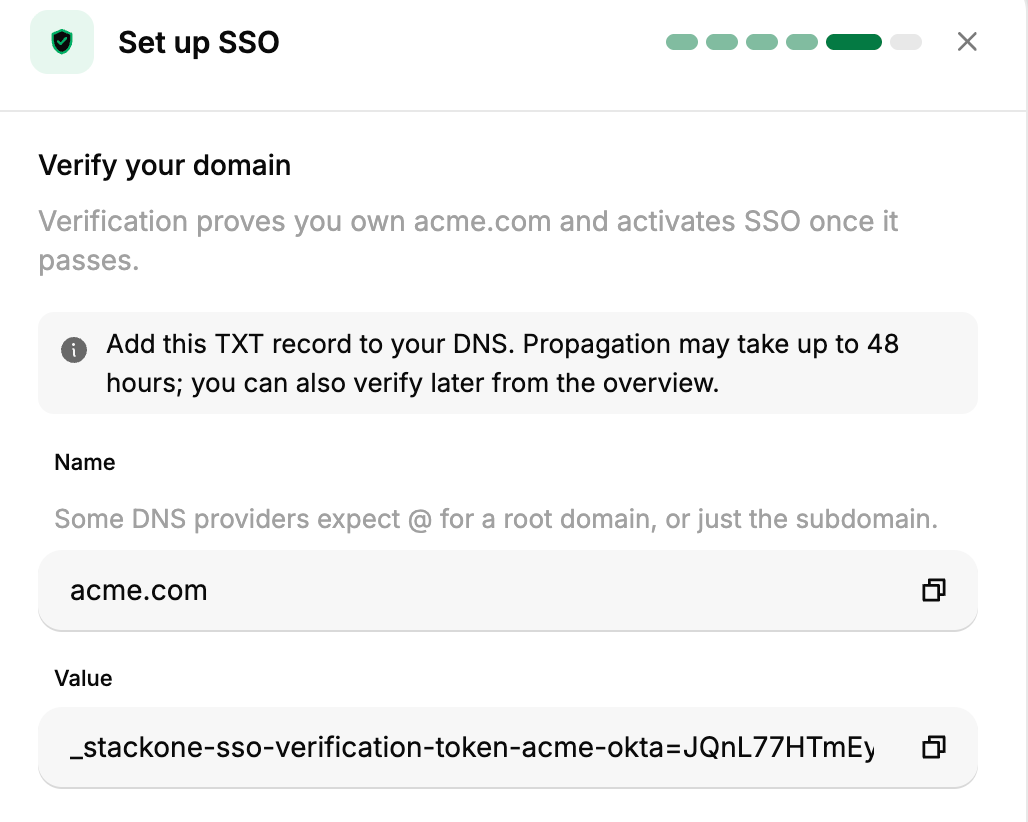 StackOne domain verification step showing the DNS TXT record to add.