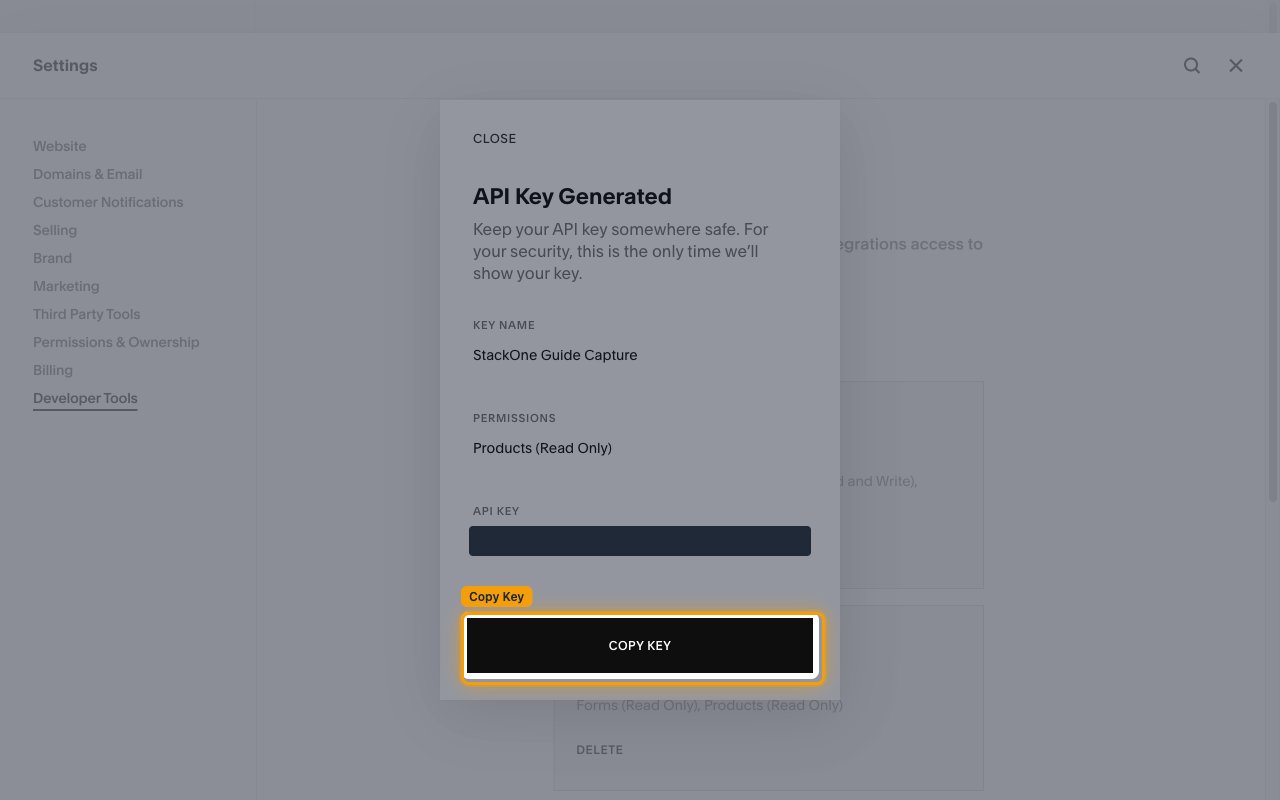API Key Generated screen with the key value redacted and the Copy Key button highlighted