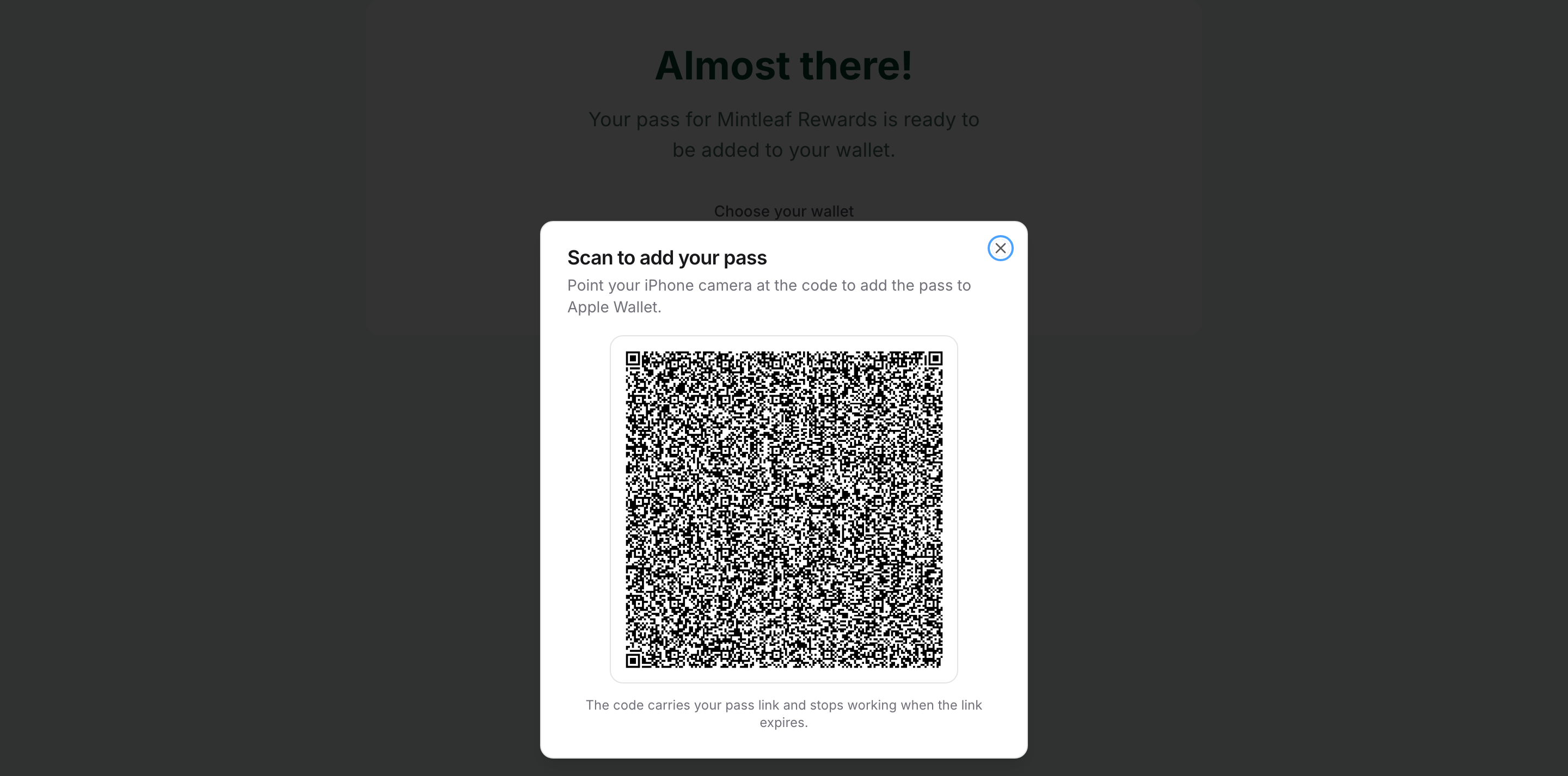 The Scan to add your pass dialog showing a QR code to scan with an iPhone