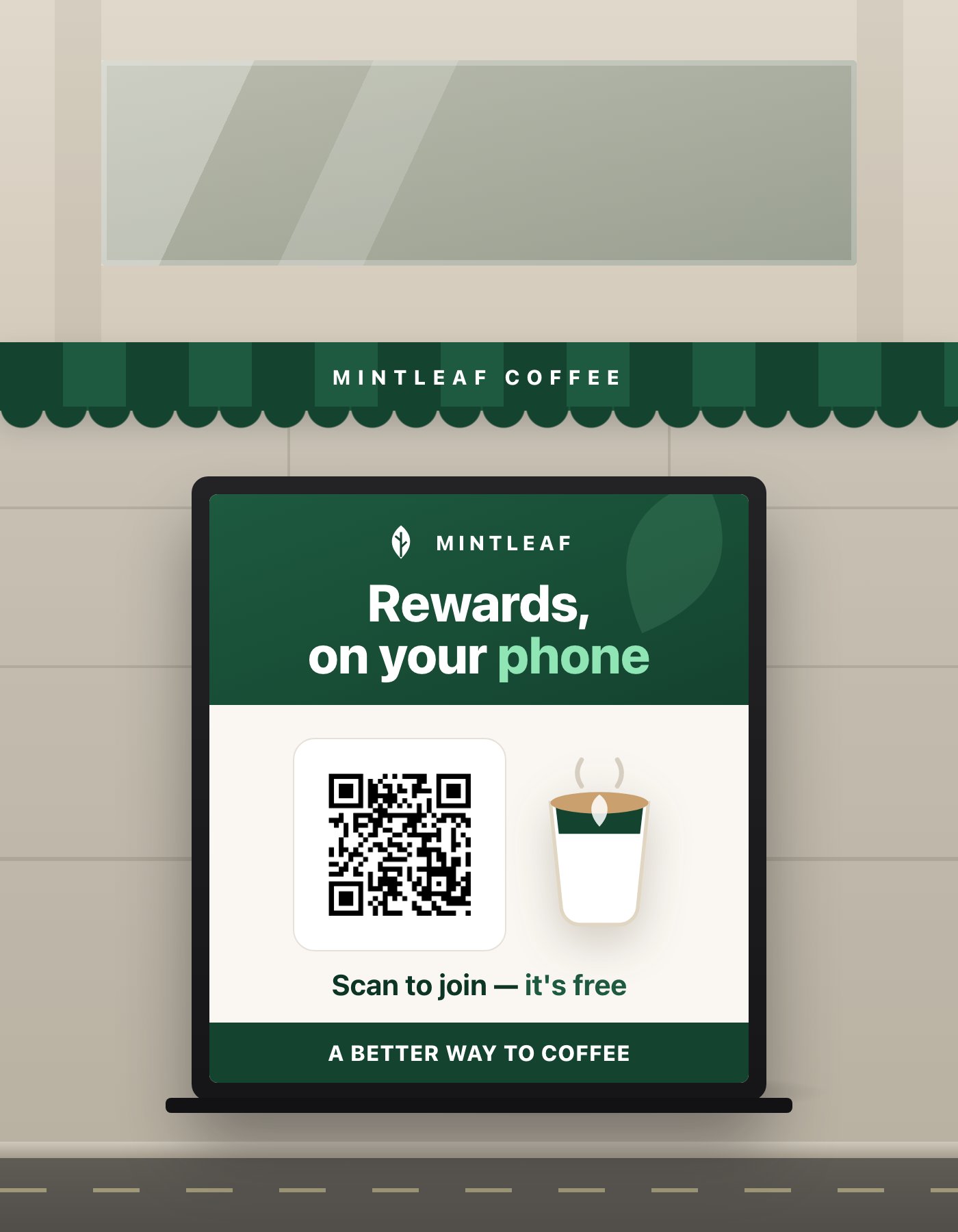 A Mintleaf Rewards A-frame pavement sign on a sidewalk outside the café, under a green Mintleaf Coffee awning, with the headline Rewards, on your phone and a large QR code