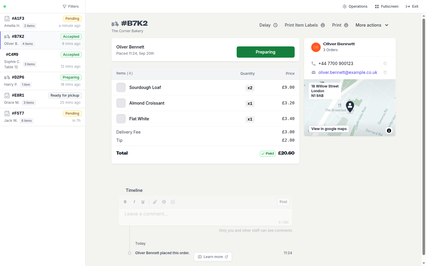 An accepted delivery order showing the Preparing button, items, totals and the delivery address map