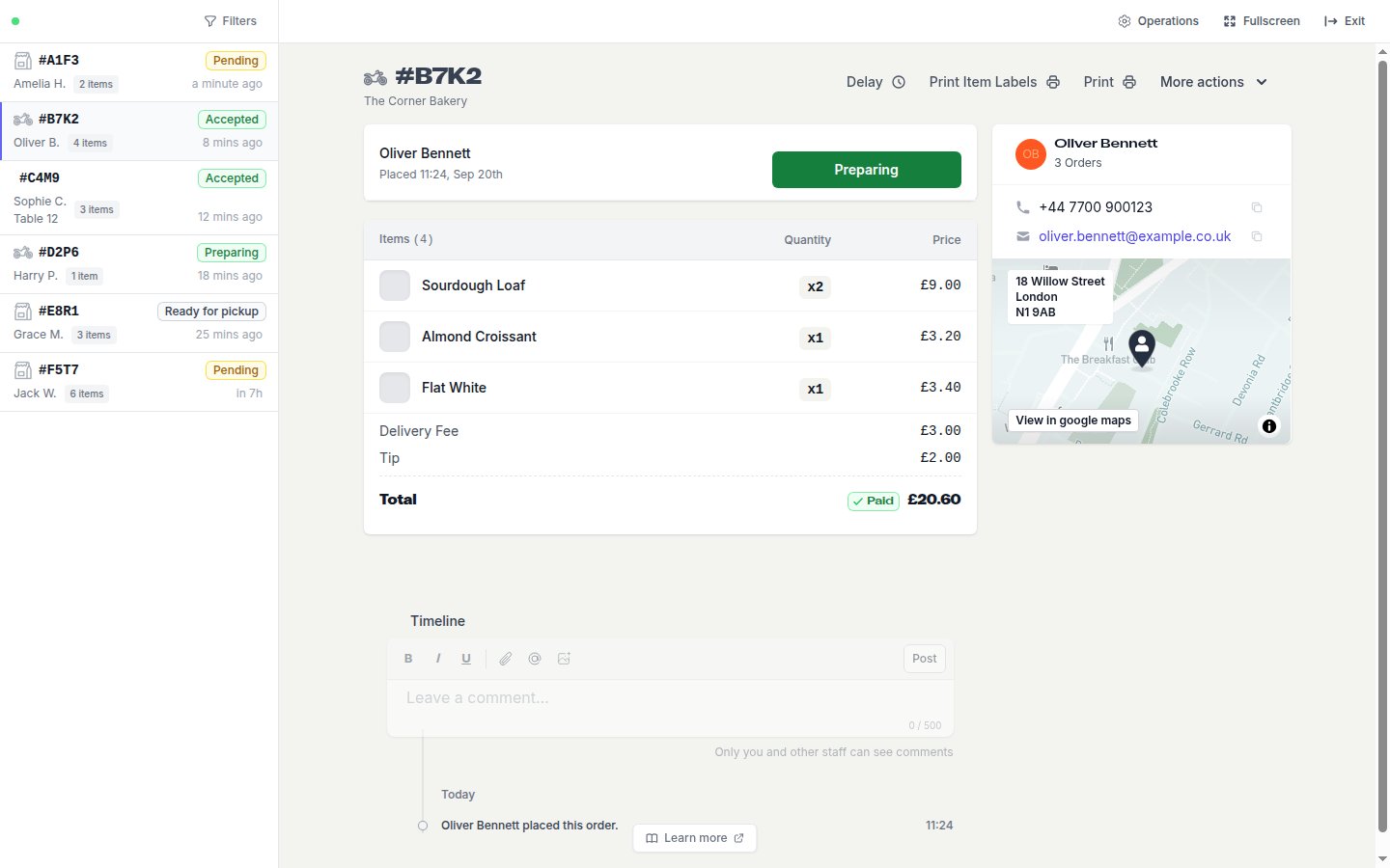 An accepted delivery order showing the Preparing button, items, totals and the delivery address map