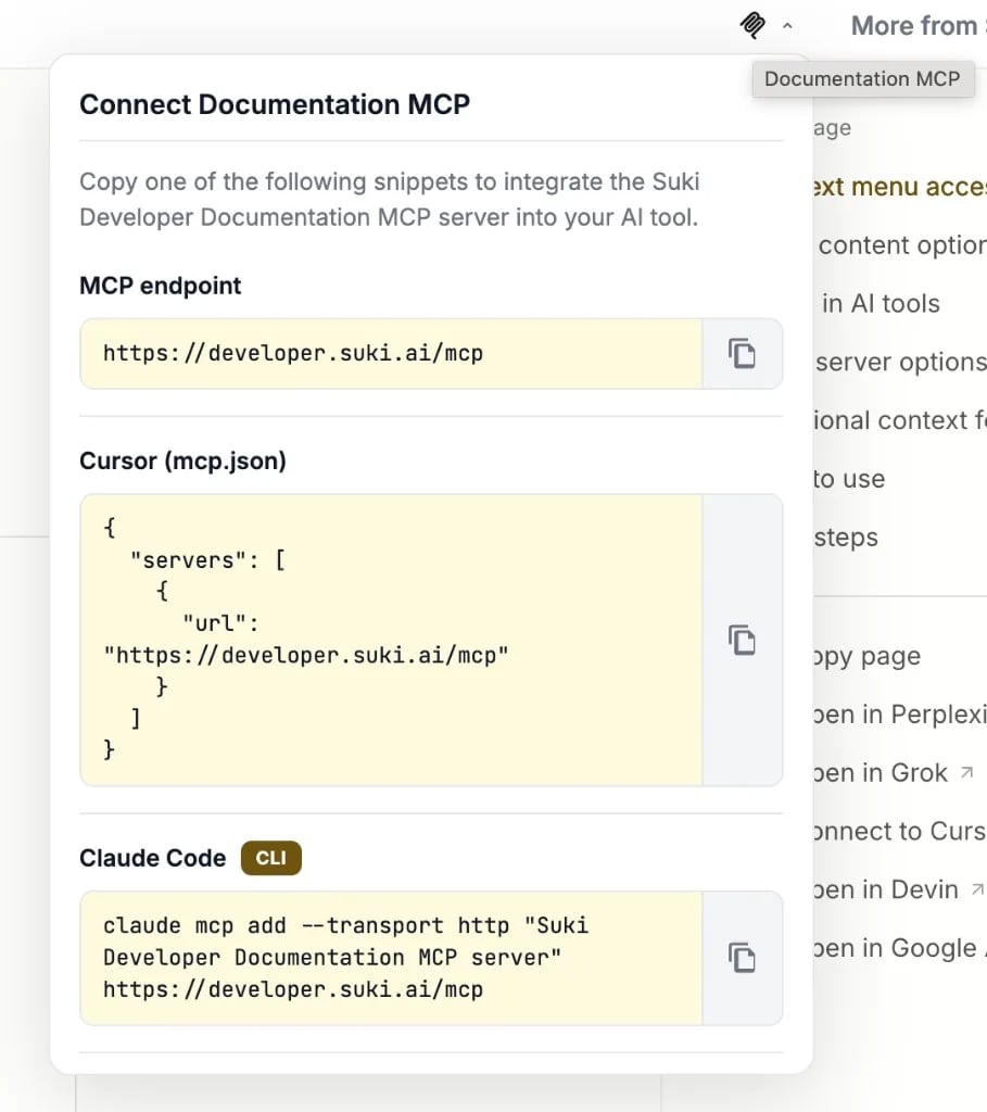 Documentation MCP dropdown in the top navigation bar with copy snippets for MCP endpoint, Cursor mcp.json, and Claude Code CLI