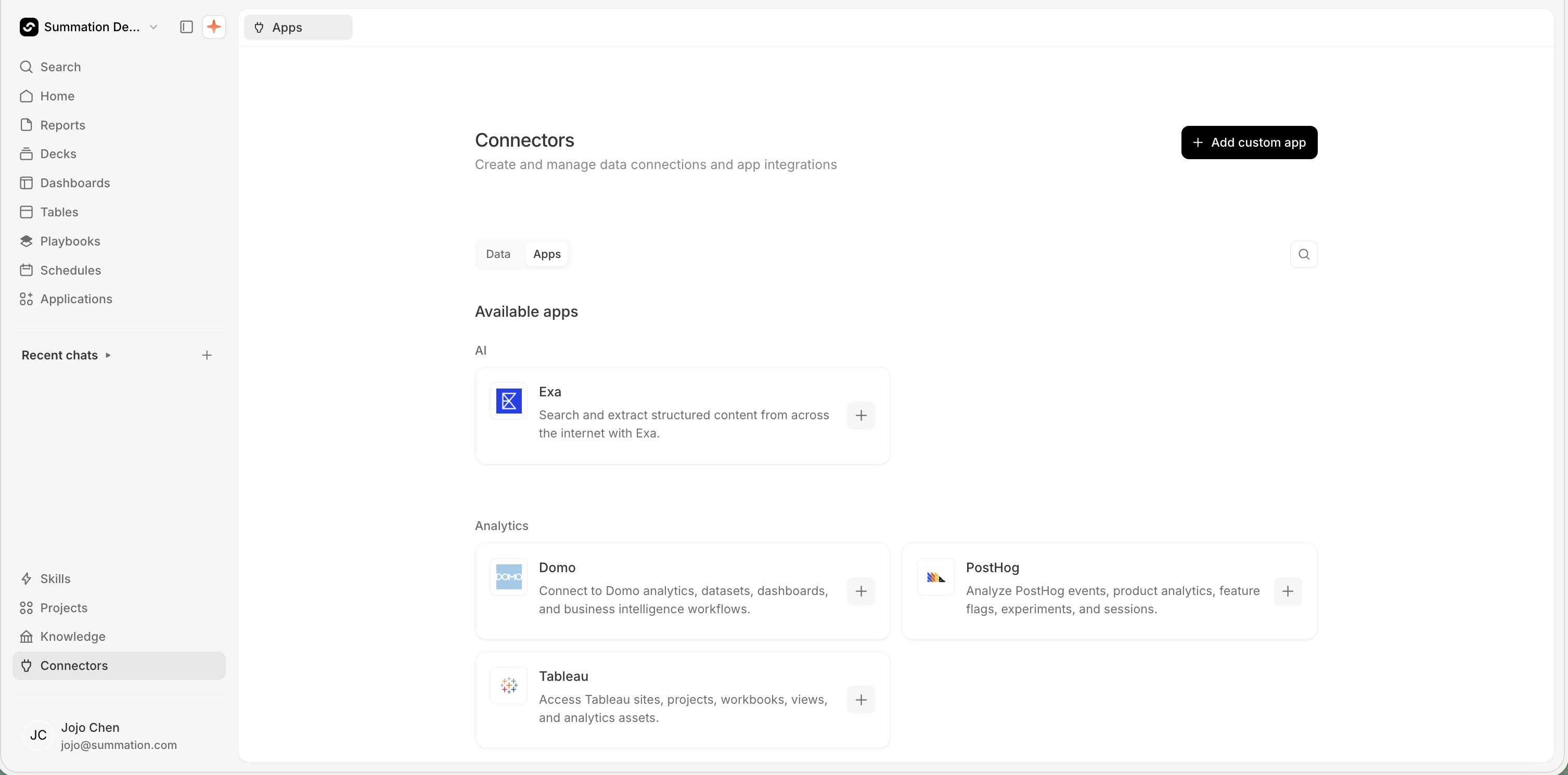 The Apps tab of the Connectors page, selected alongside a Data tab, with an Add custom app button top-right and a search field. Available apps are grouped by category: AI with Exa ('Search and extract structured content from across the internet with Exa.'), and Analytics with Domo ('Connect to Domo analytics, datasets, dashboards, and business intelligence workflows.'), PostHog ('Analyze PostHog events, product analytics, feature flags, experiments, and sessions.'), and Tableau ('Access Tableau sites, projects, workbooks, views, and analytics assets.'). Each card has an icon, a description, and a + button to connect.