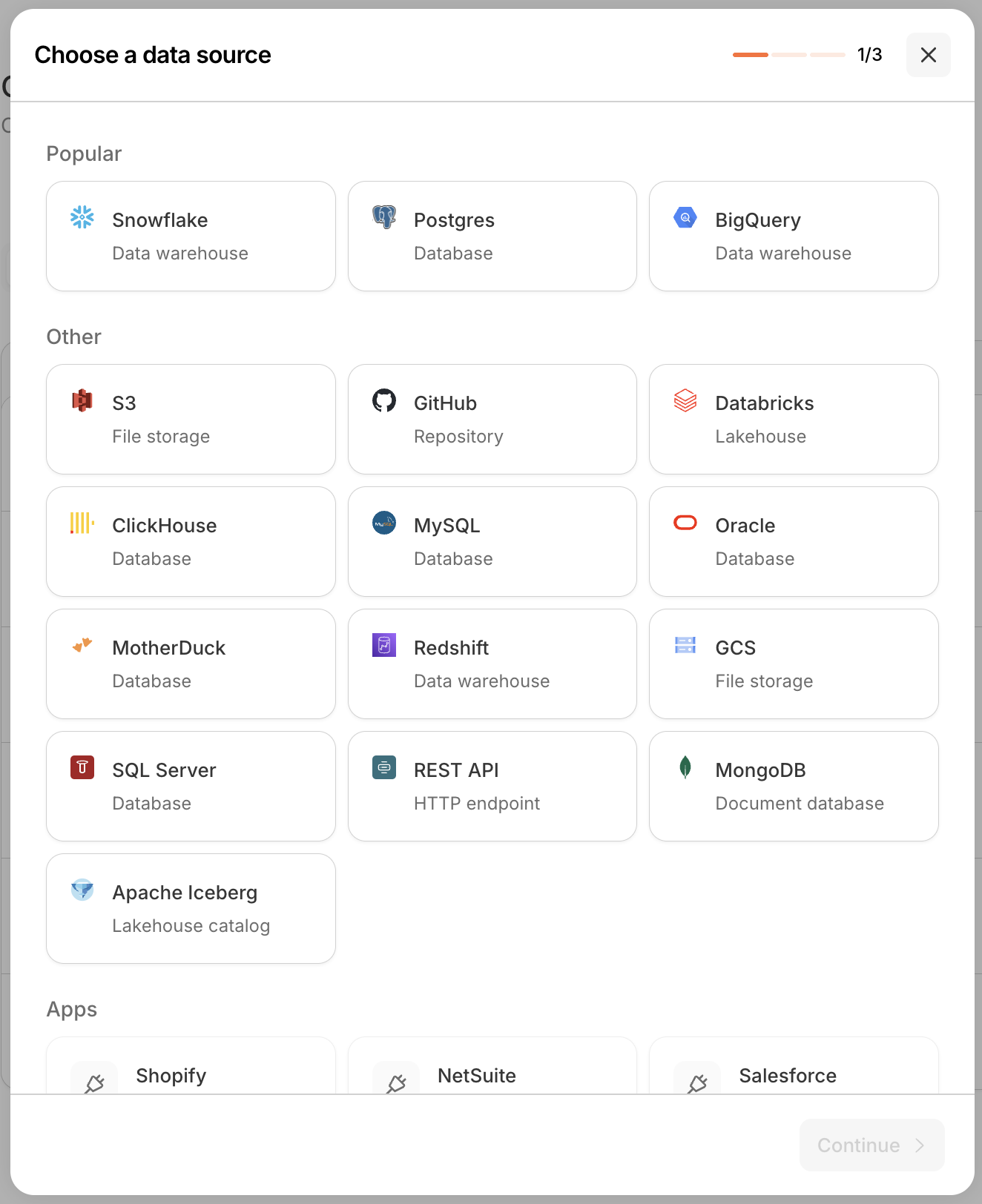 Step 1 of 3 of the New connection wizard, titled 'Choose a data source' with a progress indicator reading 1/3. A Popular row offers Snowflake (Data warehouse), Postgres (Database), and BigQuery (Data warehouse). An Other section lists S3 (File storage), GitHub (Repository), Databricks (Lakehouse), ClickHouse, MySQL, Oracle, MotherDuck, Redshift, GCS, SQL Server, REST API (HTTP endpoint), MongoDB (Document database), and Apache Iceberg (Lakehouse catalog). An Apps section below starts with Shopify, NetSuite, and Salesforce.