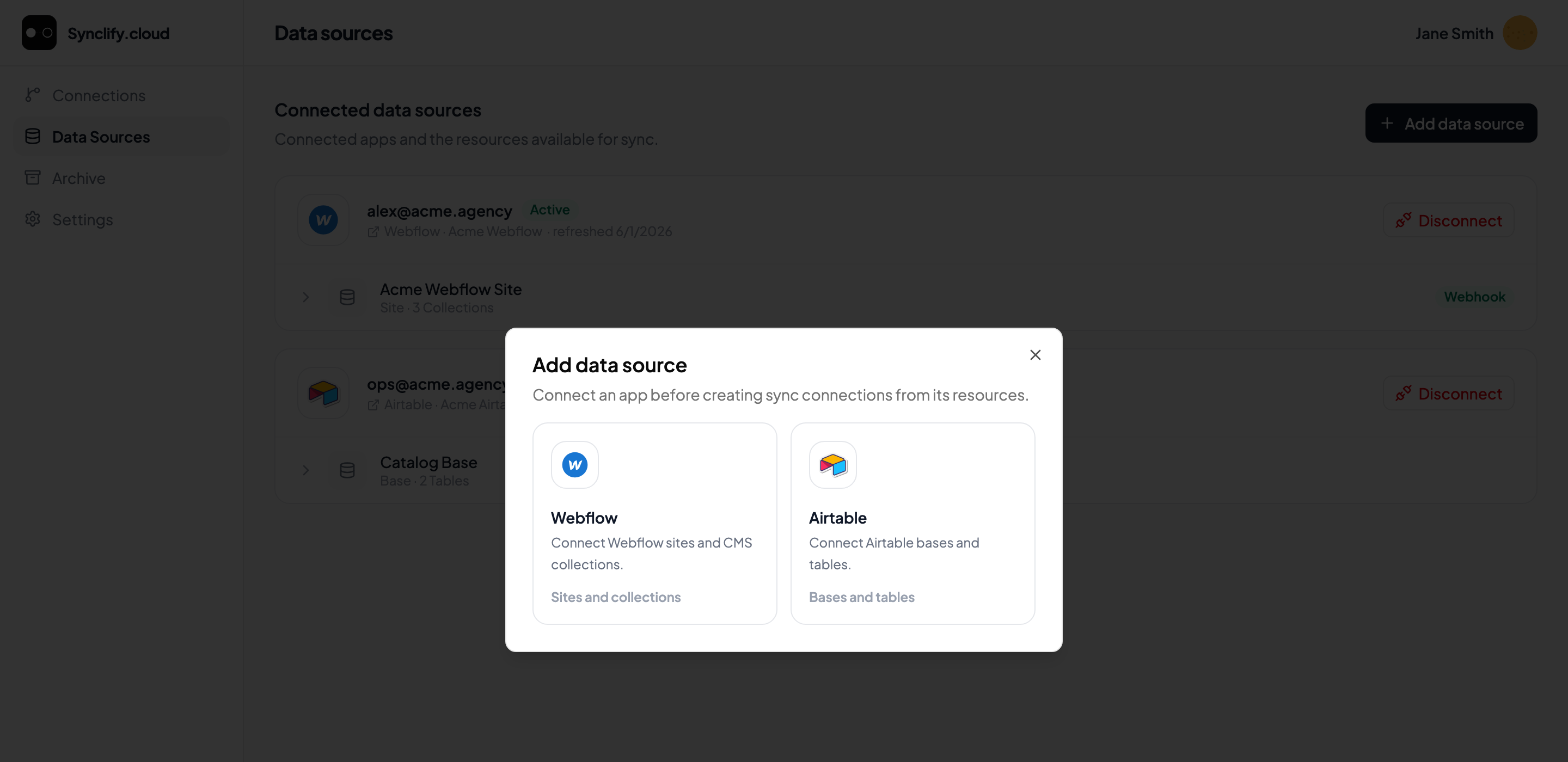Add data source dialog showing Webflow and Airtable provider cards