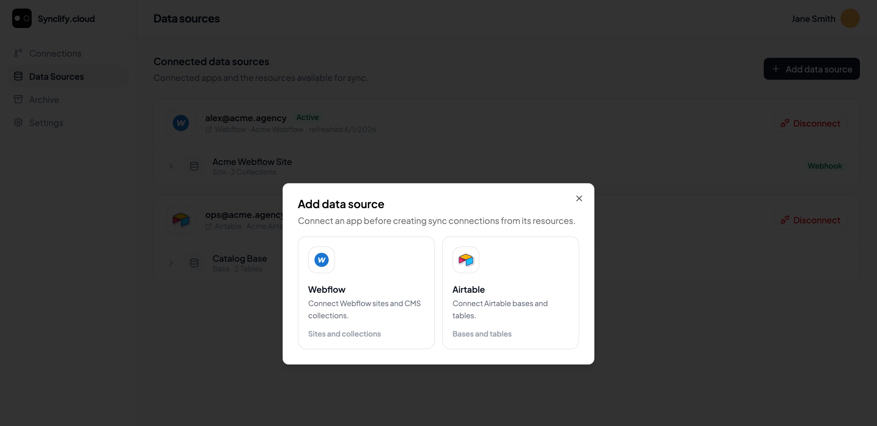Add data source dialog showing Webflow and Airtable provider cards