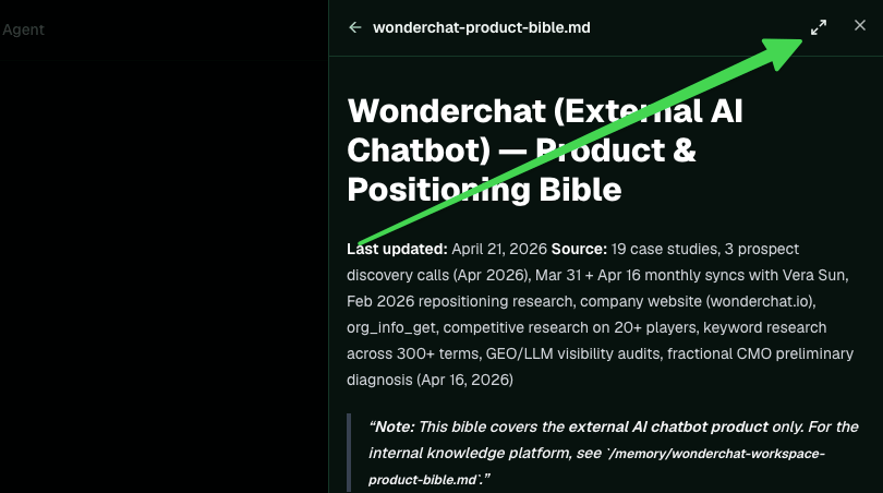 An open file with an arrow pointing to the expand-to-full-screen icon.