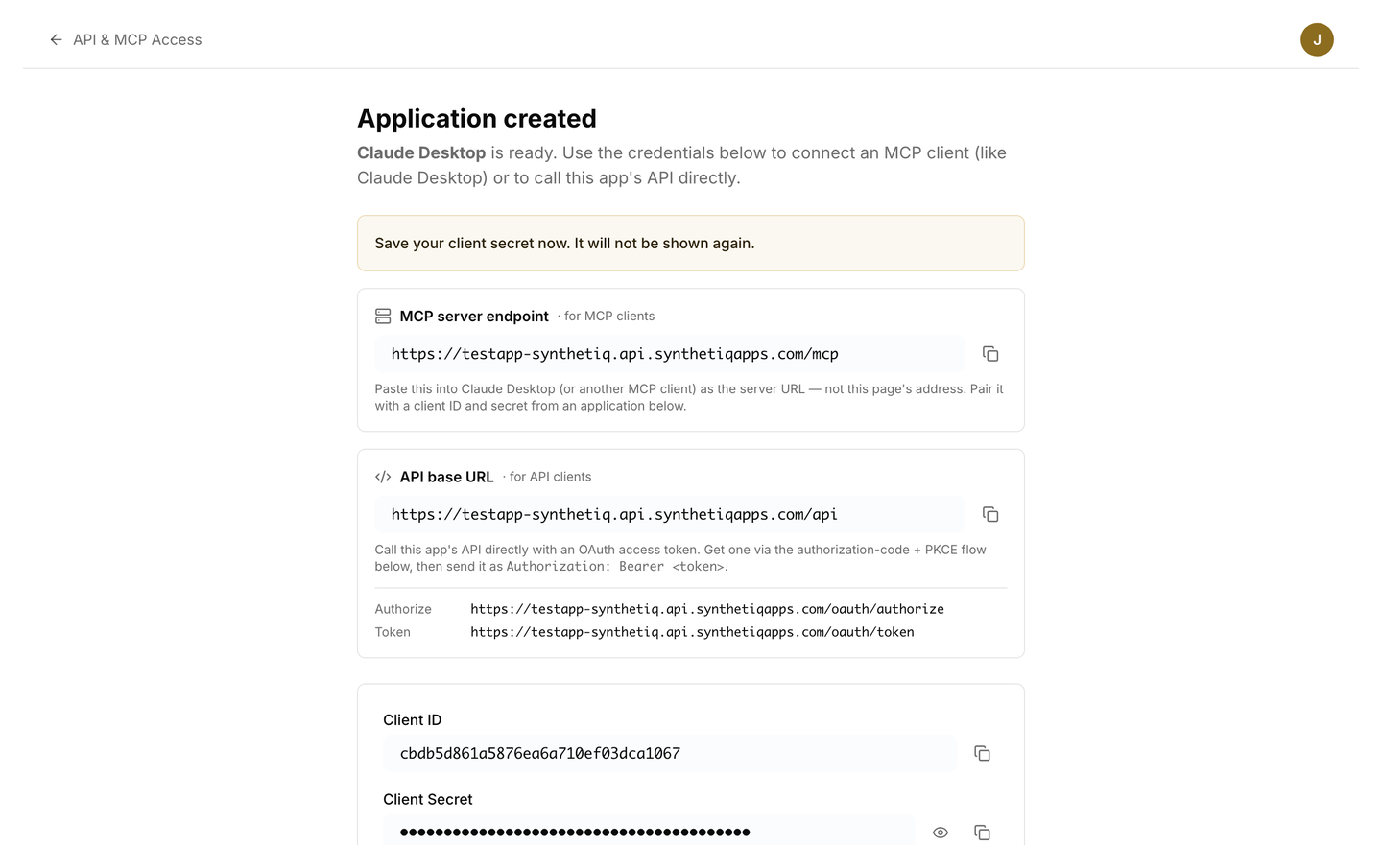 The Application created screen showing the Client ID and a masked Client Secret