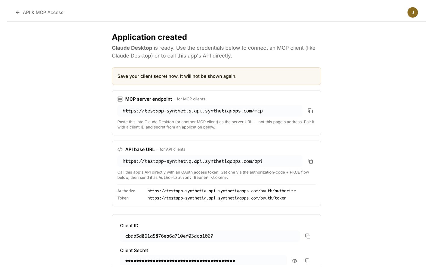 The Application created screen showing the Client ID and a masked Client Secret
