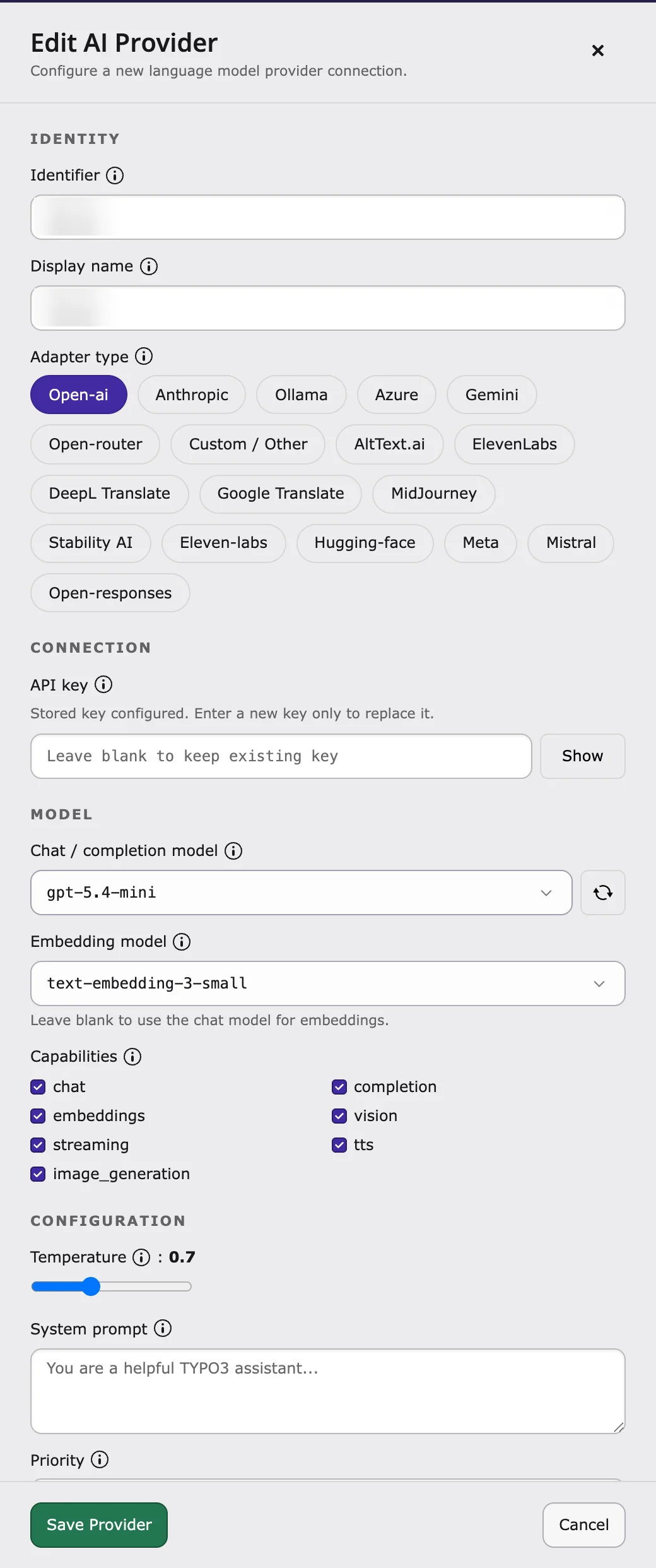 Edit AI Provider drawer with adapter type, API key, models and capabilities