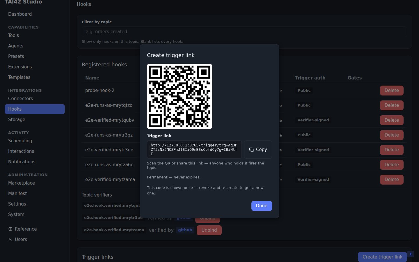 The Studio Hooks page create-trigger-link dialog showing the generated QR code.