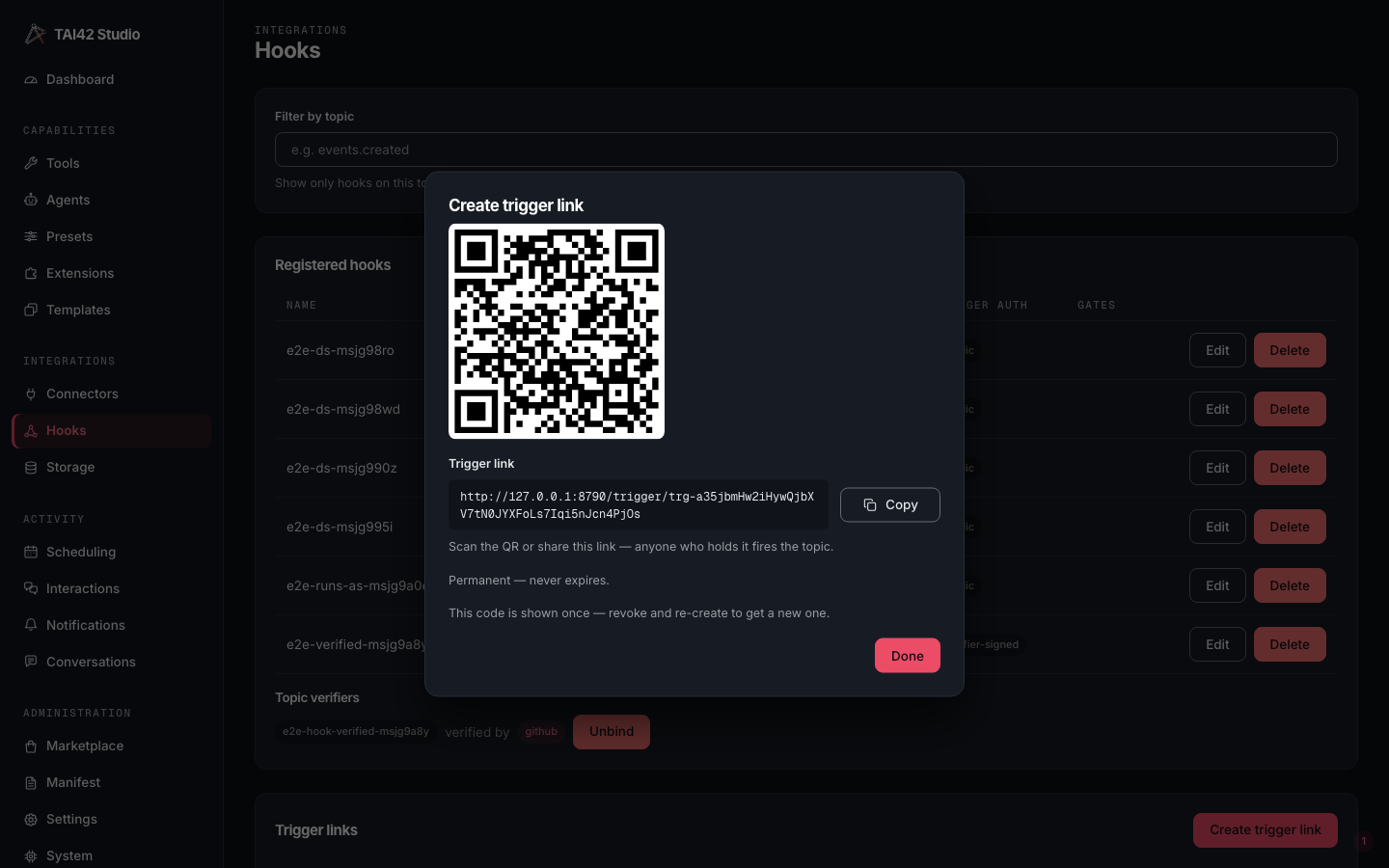The Studio Hooks page create-trigger-link dialog showing the generated QR code.