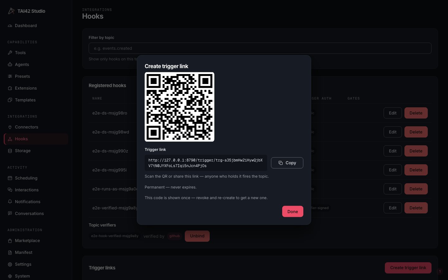 The Studio Hooks page create-trigger-link dialog showing the generated QR code.