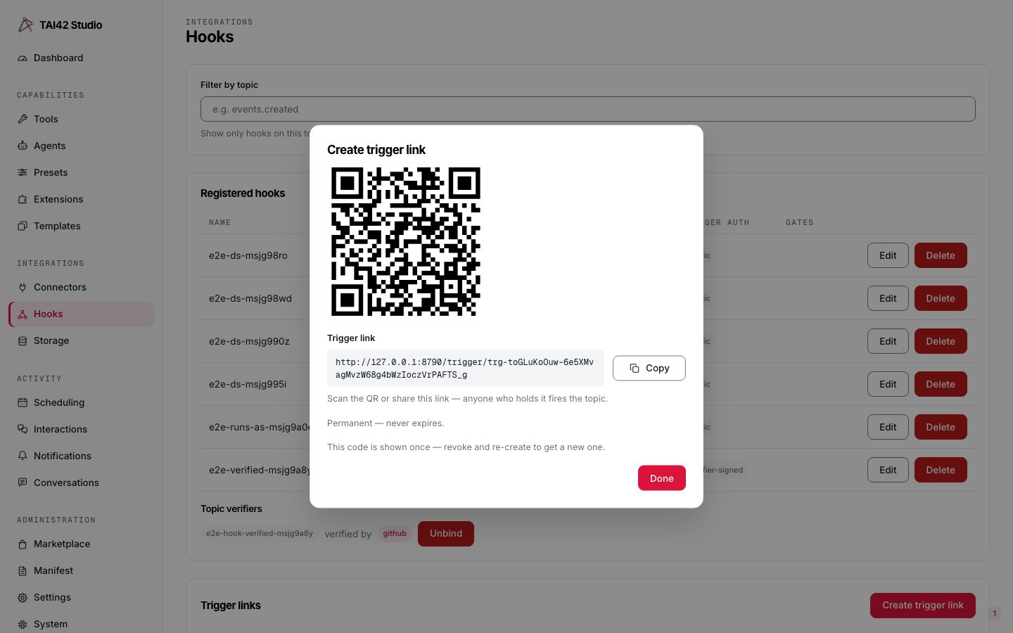 The Studio Hooks page create-trigger-link dialog showing the generated QR code.