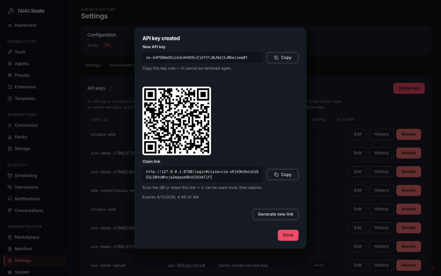 The API-keys create dialog showing a newly minted key and its QR claim-link step.