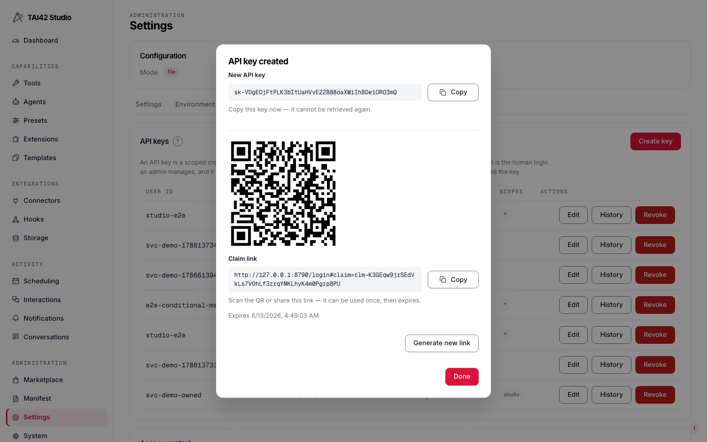 The API-keys create dialog showing a newly minted key and its QR claim-link step.