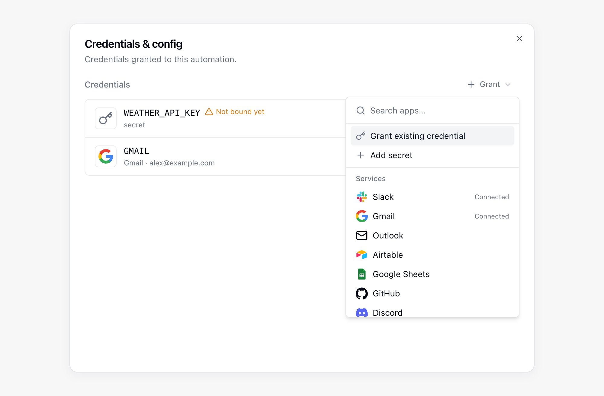 Credentials & config panel of an automation with a placeholder that is not bound yet, a granted Gmail connection, and the Grant menu open