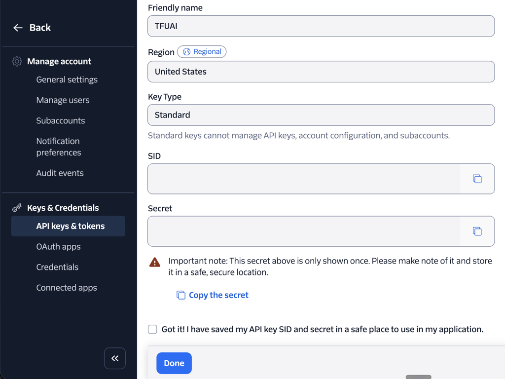 The Twilio Console after a key is created, showing the SID and Secret fields with a copy button on each. Both fields are shown empty here; on your own screen they hold the values to copy.